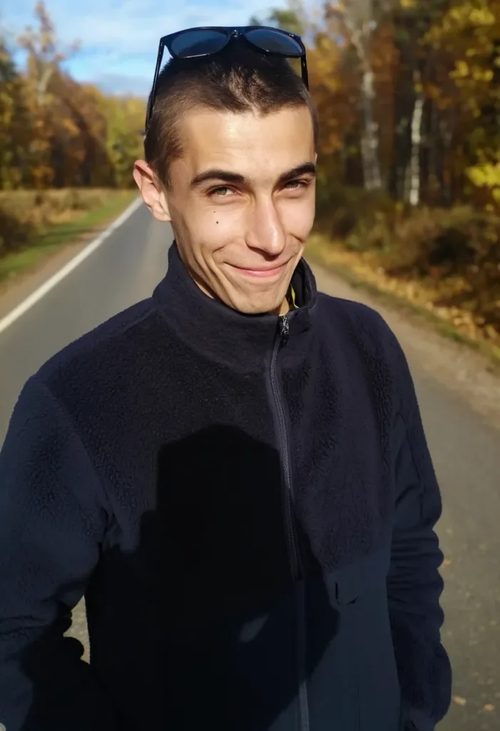 Николай